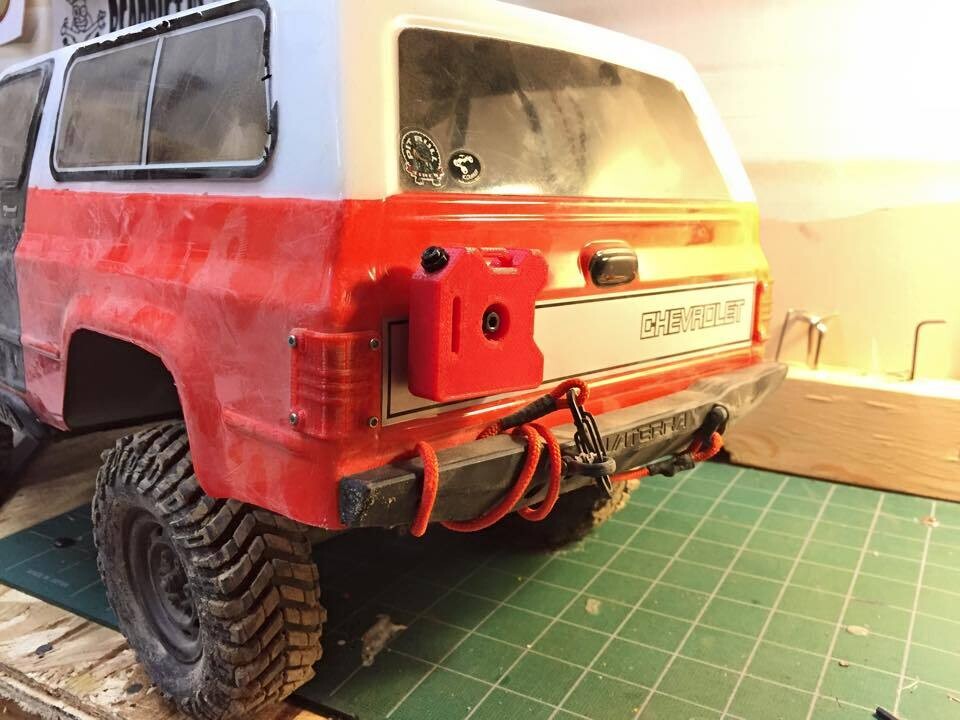 1/10th scale fuel can attached to the back of a remote control car for scale