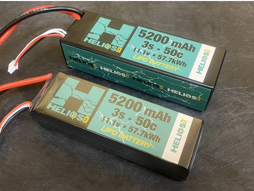 A Helios RC 3S 5200 mAh 50c Lipo battery with Deans connector, displayed next to another battery