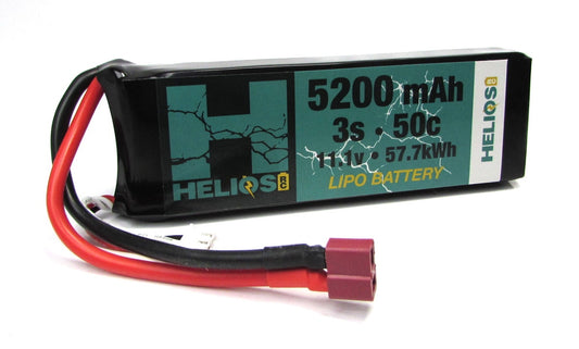A Helios RC 3S 5200 mAh 50c Lipo battery with wires and connectors, predominantly black in color with green and white label detailing.