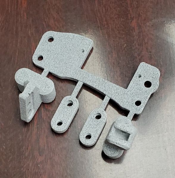 Vader Products:  Capra Skid replacement 3d printed parts for dig servo