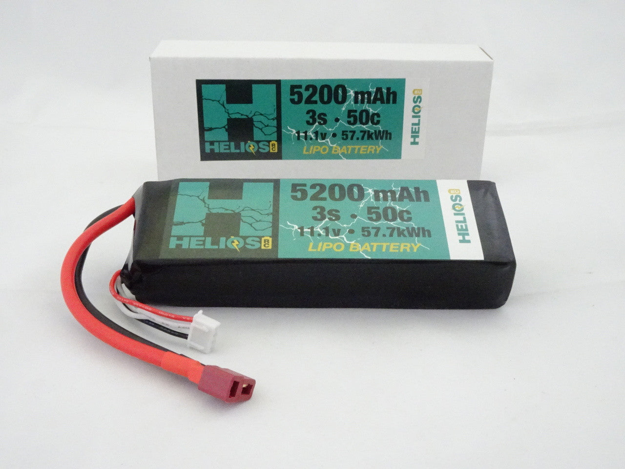 one 5200 mAh 3s 50c 11.1v 57.7 kWh lipo battery in front of its package 