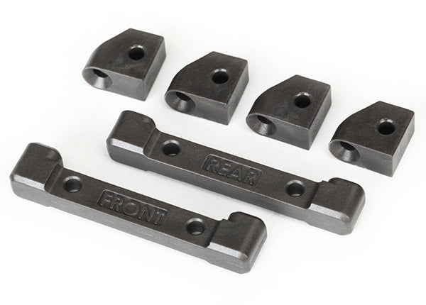 Traxxas 8334 Mounts, suspension arms (front & rear)/ hinge pin retainers (4)