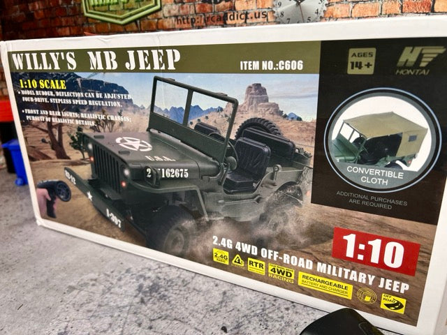 Boxed model of a Willy's MB Jeep with desert scene illustration