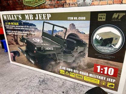 Boxed model of a Willy's MB Jeep with desert scene illustration