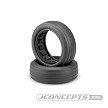 Two black tires on a white background